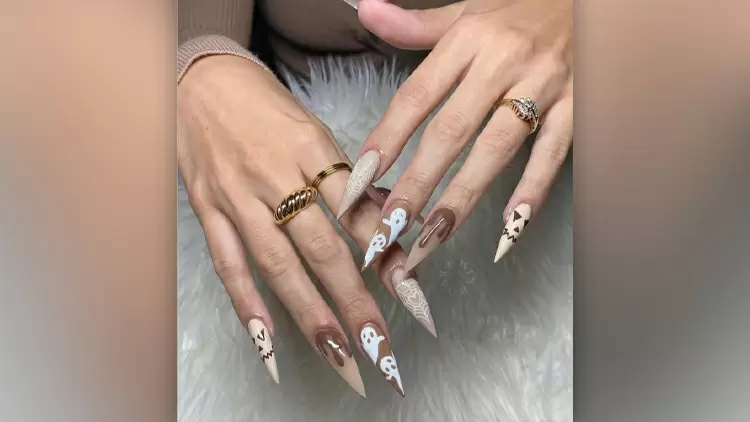 These manicures exude holiday vibes with their warm caramel colors and subtle overtones. 